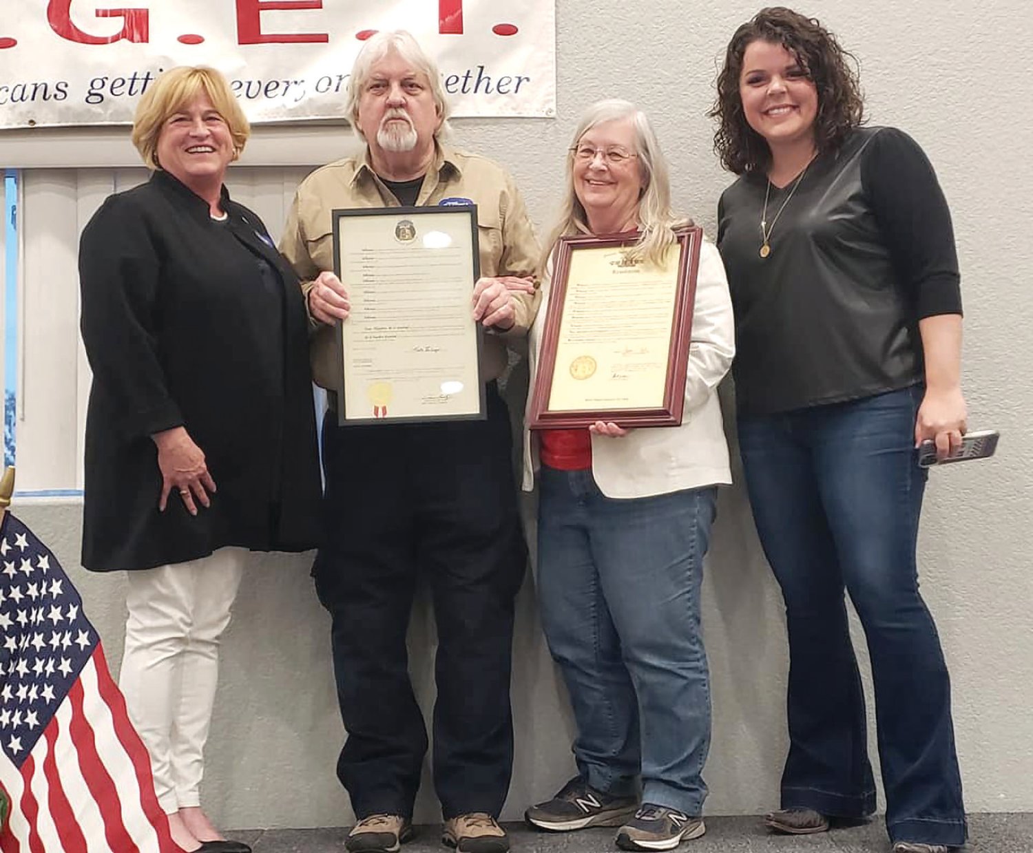 Outstanding Republicans of the Year, Charles and Pati Knight, receive proclamations from Sen. Karla Eslinger and Rep. Hannah Kelly.